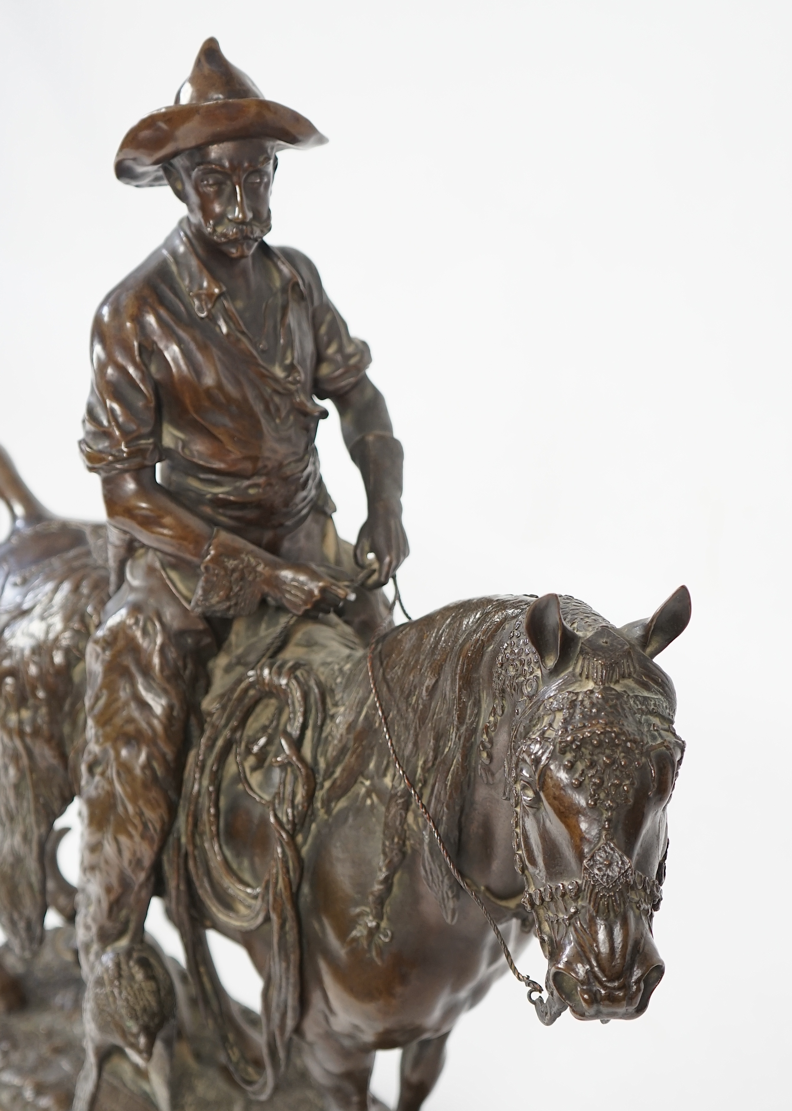 Walter Winans (St. Petersburg, 1852-Parsloe Park, Essex, 1920), a cast bronze of the artist, as a cowboy, riding the Arab stallion Skowronek, 50cm wide, 66cm high, overall 79.5cm high